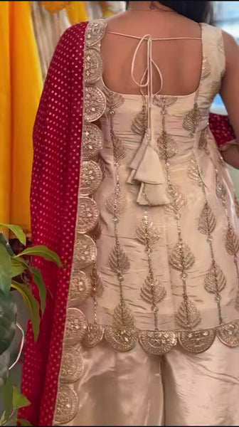 Graceful Beige Sharara Suit with Maroon Dupatta
