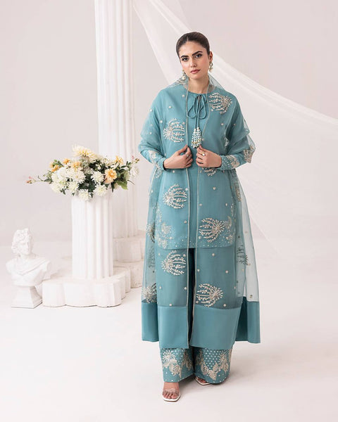 Teal Elegance: Embellished Suit with Sheer Dupatta and Graceful Traditional Charm