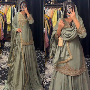 Embroidered Green Silk Lehenga Choli with Dupatta