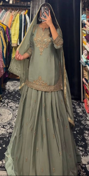 Embroidered Green Silk Lehenga Choli with Dupatta