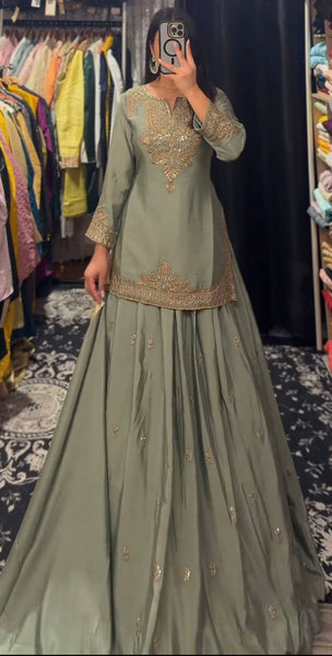 Embroidered Green Silk Lehenga Choli with Dupatta