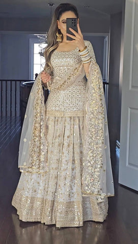 Radiant White Embroidered Silk Sharara Ensemble