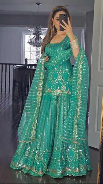 Regal Allure Lavish Green Embroidered Lehenga Choli for Celebrations